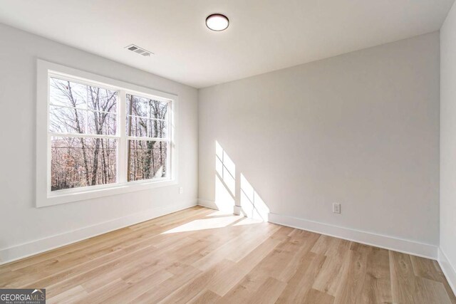 3110 Granada Way, Gainesville, GA 30506 - unfurnished room with baseboards and light wood-type flooring