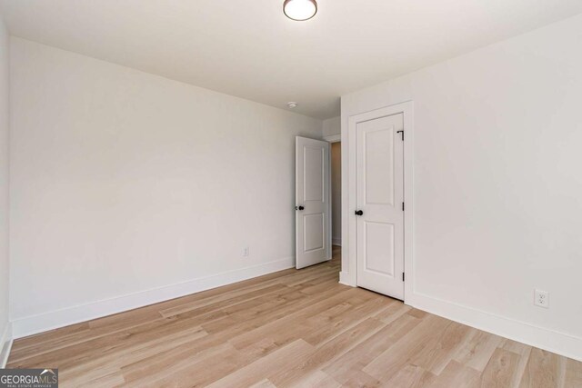 3110 Granada Way, Gainesville, GA 30506 - spare room with baseboards and light wood finished floors