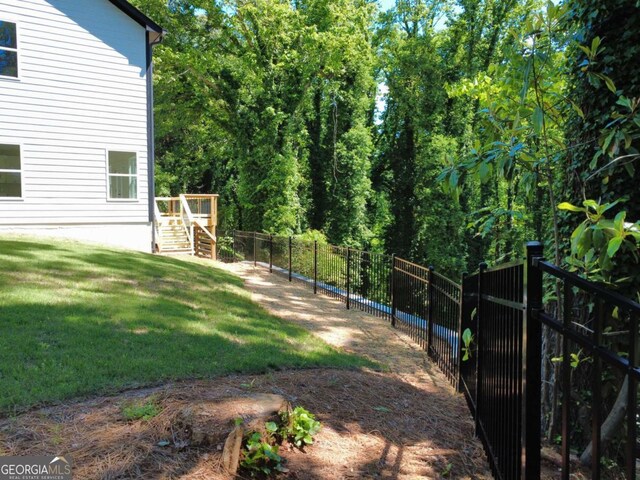 3110 Granada Way, Gainesville, GA 30506 - fenced yard featuring stairway and a deck