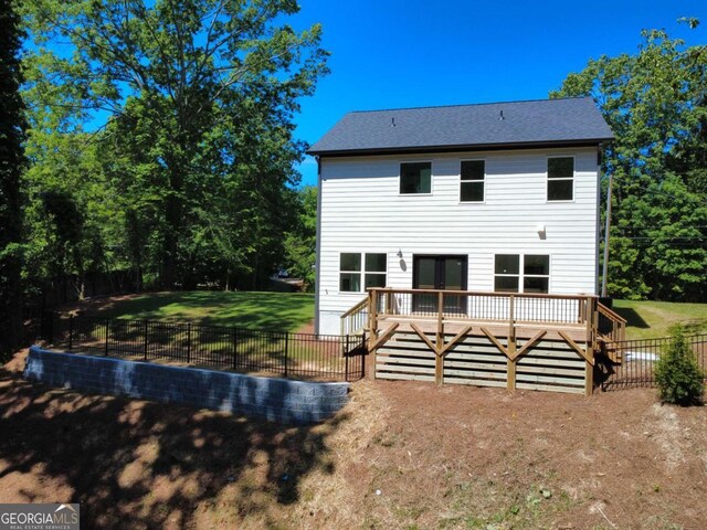 3110 Granada Way, Gainesville, GA 30506 - rear view of house with a wooden deck and a fenced backyard