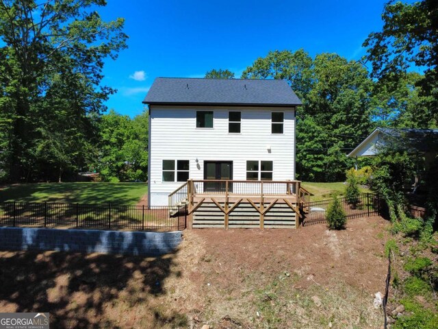 3110 Granada Way, Gainesville, GA 30506 - rear view of house with a deck and a fenced backyard