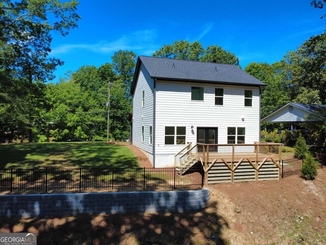 3110 Granada Way, Gainesville, GA 30506 - rear view of house with a deck, a fenced backyard, and stairs