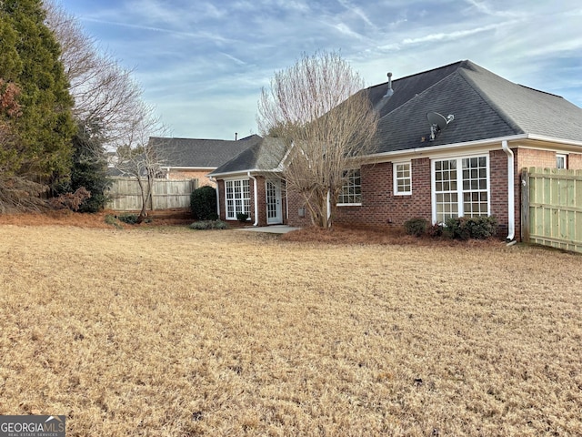 410 Oakpark Ter, Mcdonough, GA 30253 - back of property featuring brick siding and a shingled roof