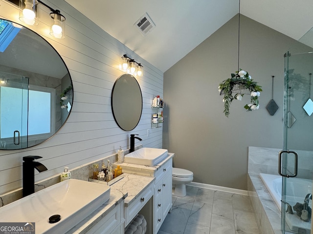 2610 Stokesley Way, Snellville, GA 30078 - full bath with double vanity, marble look tile flooring, wood walls, a bath, and vaulted ceiling