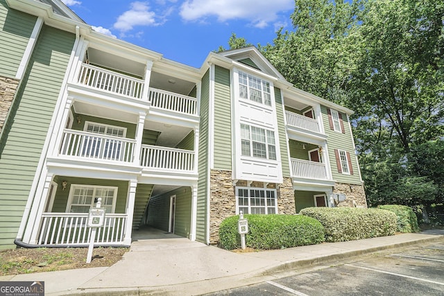 328 Bentley Pl Unit 328, Tucker, GA 30084 - view of property with uncovered parking