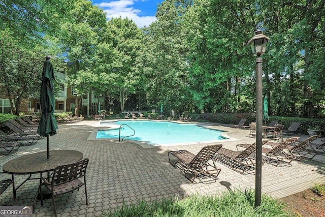 328 Bentley Pl Unit 328, Tucker, GA 30084 - community pool with a patio and view of scattered trees