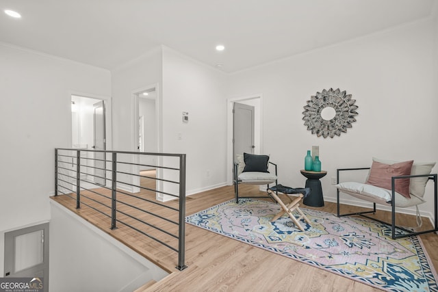 2926 5th St SW, Atlanta, GA 30315 - living area with an upstairs landing, wood finished floors, ornamental molding, recessed lighting, and baseboards