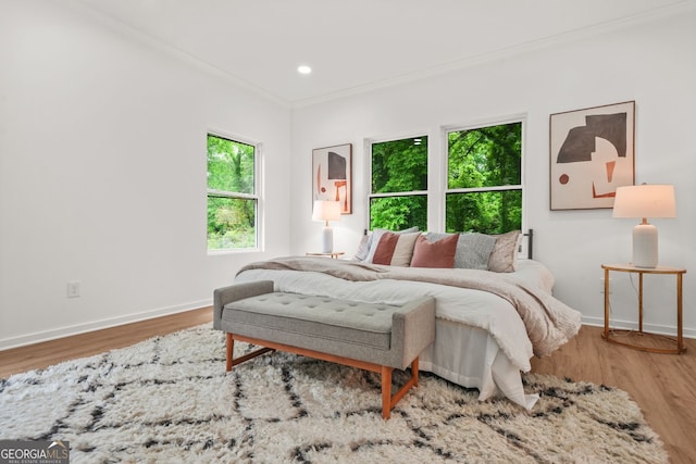 2926 5th St SW, Atlanta, GA 30315 - bedroom with crown molding, wood finished floors, baseboards, and recessed lighting
