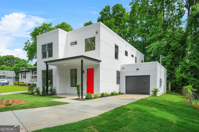 2926 5th St SW, Atlanta, GA 30315 - contemporary house featuring a front lawn, driveway, and stucco siding