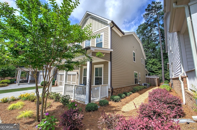 2657 Cedar Pine Way, Atlanta, GA 30360 - view of home's exterior with a porch and board and batten siding
