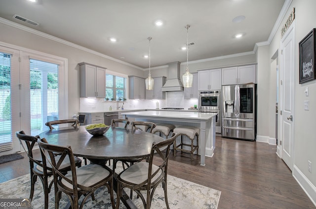 2657 Cedar Pine Way, Atlanta, GA 30360 - dining area with dark wood-type flooring, crown molding, and recessed lighting