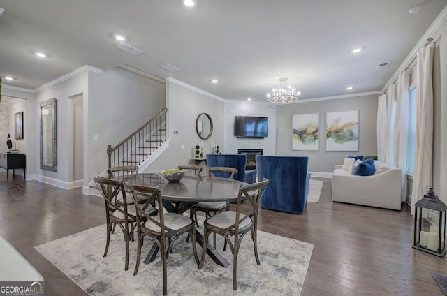 2657 Cedar Pine Way, Atlanta, GA 30360 - dining room featuring stairs, crown molding, recessed lighting, a fireplace, and a chandelier