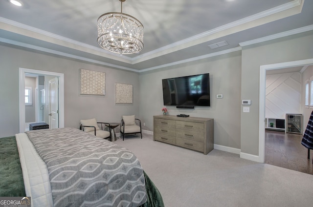 2657 Cedar Pine Way, Atlanta, GA 30360 - carpeted bedroom featuring a chandelier, a tray ceiling, crown molding, and ensuite bathroom