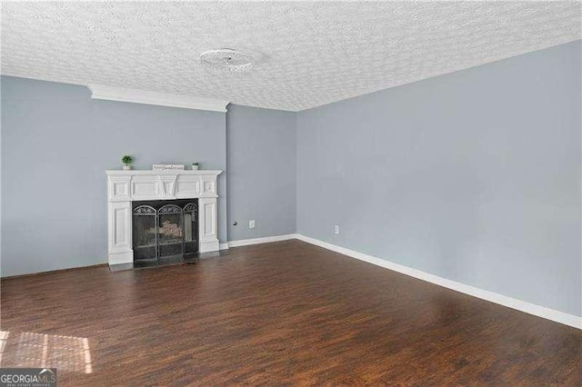 152 Maxton Ave, Dallas, GA 30132 - unfurnished living room featuring dark wood-style flooring, a textured ceiling, and a fireplace
