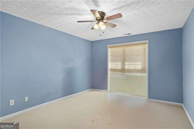 152 Maxton Ave, Dallas, GA 30132 - empty room featuring ceiling fan and a textured ceiling