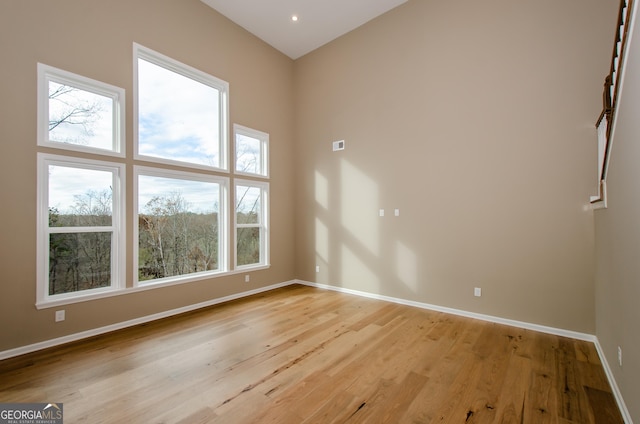8555 Scenic Ridge Way, Ball Ground, GA 30107 - empty room featuring light wood-style flooring and baseboards