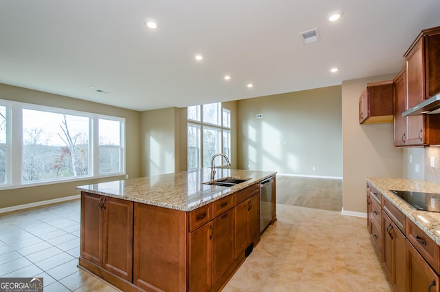 8555 Scenic Ridge Way, Ball Ground, GA 30107 - kitchen featuring a kitchen island with sink, dishwasher, plenty of natural light, light stone countertops, and recessed lighting