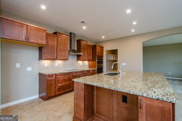 8555 Scenic Ridge Way, Ball Ground, GA 30107 - kitchen with wall chimney range hood, a sink, black electric cooktop, double oven, and a kitchen island with sink