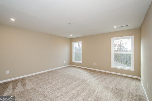 8555 Scenic Ridge Way, Ball Ground, GA 30107 - spare room featuring carpet, baseboards, and recessed lighting