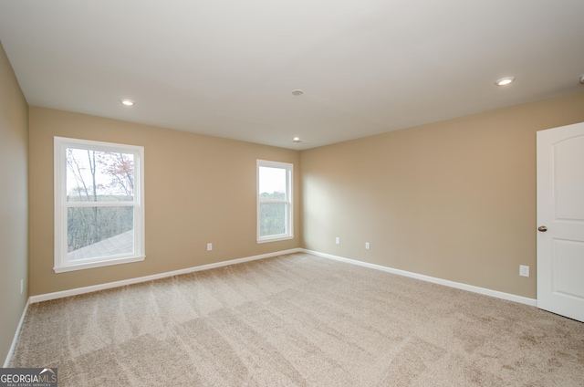 8555 Scenic Ridge Way, Ball Ground, GA 30107 - spare room featuring carpet flooring, plenty of natural light, and recessed lighting