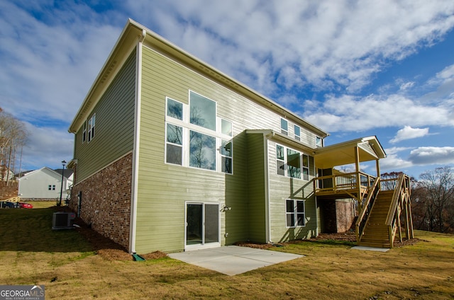 8555 Scenic Ridge Way, Ball Ground, GA 30107 - rear view of house featuring stairs, a patio area, a yard, a wooden deck, and brick siding