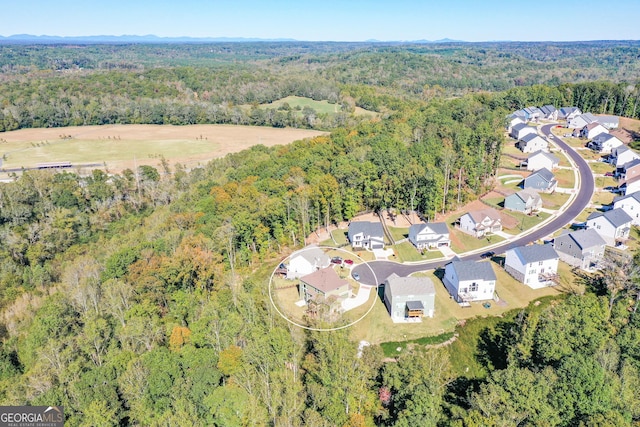 8555 Scenic Ridge Way, Ball Ground, GA 30107 - aerial view of property and surrounding area featuring a forest