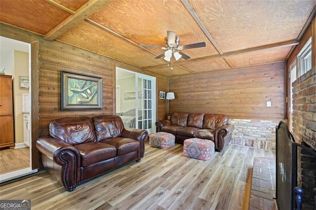 184 Rambo Pl SW, Marietta, GA 30064 - living area with ceiling fan, wood finished floors, wood ceiling with exposed beams, and wood walls