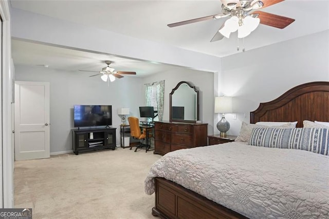 184 Rambo Pl SW, Marietta, GA 30064 - bedroom with light carpet, ceiling fan, and a desk