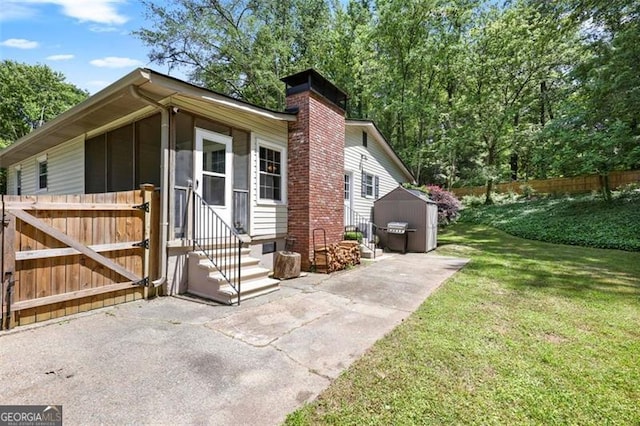 184 Rambo Pl SW, Marietta, GA 30064 - view of side of property featuring entry steps and a chimney