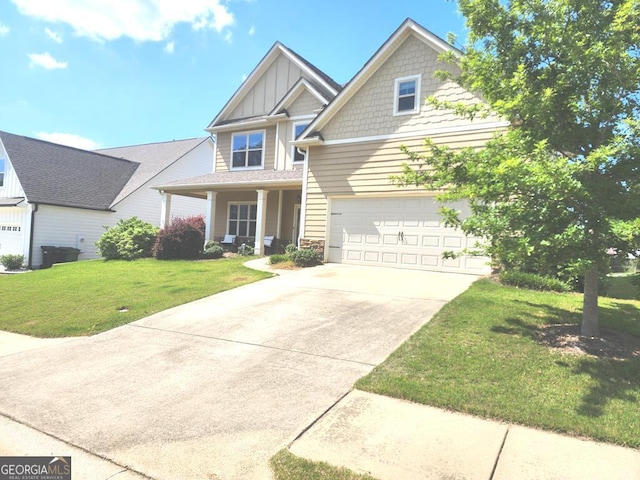 7613 Mockernut Way, Midland, GA 31820 - craftsman house with board and batten siding, a front lawn, driveway, and a porch