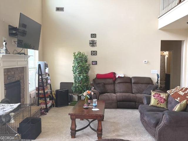 7613 Mockernut Way, Midland, GA 31820 - carpeted living area with a high ceiling and a stone fireplace