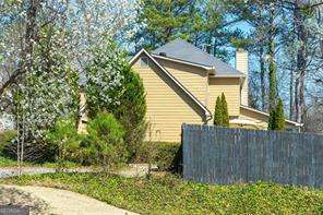 2366 Battle Forest Dr SW, Marietta, GA 30064 - view of home's exterior featuring a chimney