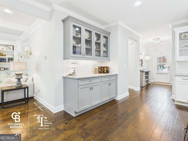 1877 Prince Pl, Watkinsville, GA 30677 - bar area with decorative backsplash, crown molding, dark wood-style flooring, baseboards, and recessed lighting