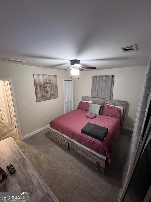 1132 SE Oak Knoll Ter, Atlanta, GA 30315 - carpeted bedroom featuring baseboards, a closet, and ceiling fan