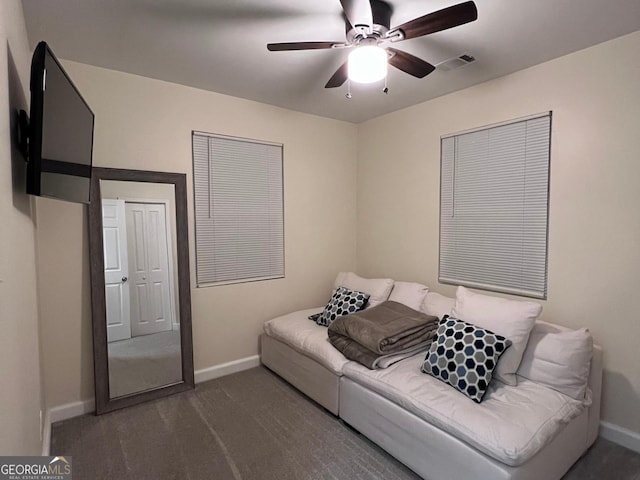 1132 SE Oak Knoll Ter, Atlanta, GA 30315 - carpeted living room featuring baseboards and a ceiling fan