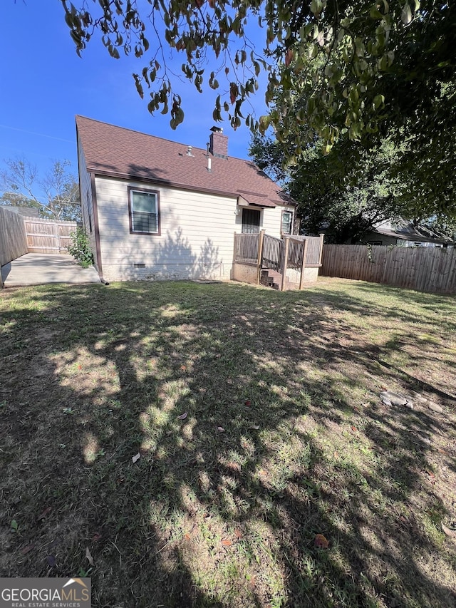 1132 SE Oak Knoll Ter, Atlanta, GA 30315 - rear view of house with a chimney, a patio, a deck, and crawl space