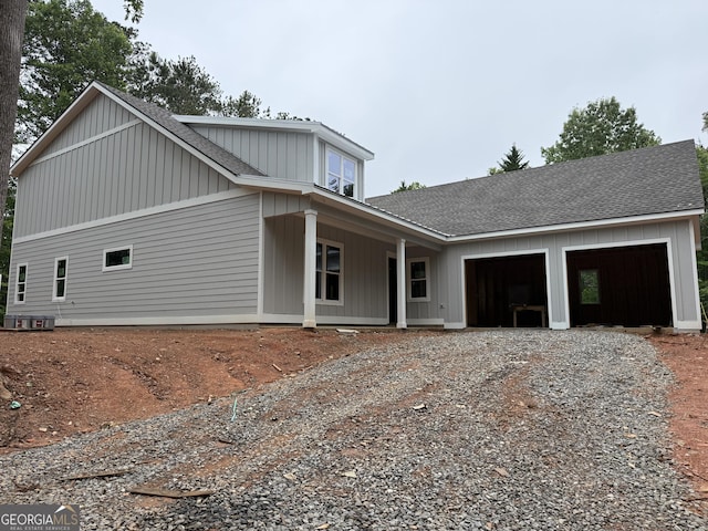 2135 Salem Church Rd, Jasper, GA 30143 - view of front of home with driveway, a garage, a shingled roof, and a porch