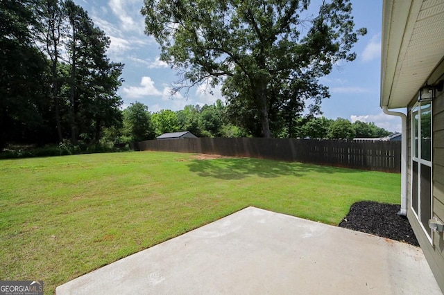 170 Kinsley Way, Statham, GA 30666 - fenced backyard with a patio