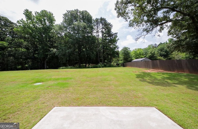 170 Kinsley Way, Statham, GA 30666 - view of yard with a patio area