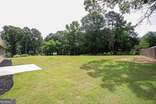 170 Kinsley Way, Statham, GA 30666 - view of green lawn with a patio