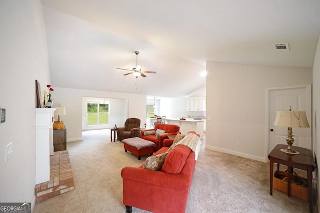 170 Kinsley Way, Statham, GA 30666 - living room with vaulted ceiling, light carpet, and a ceiling fan