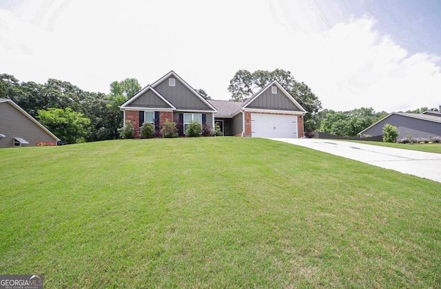 170 Kinsley Way, Statham, GA 30666 - craftsman-style home featuring concrete driveway, board and batten siding, brick siding, a front yard, and an attached garage