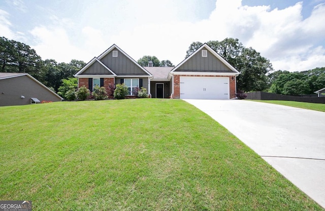 170 Kinsley Way, Statham, GA 30666 - craftsman-style house with board and batten siding, brick siding, driveway, and an attached garage