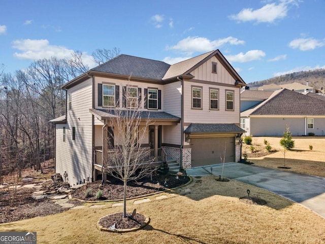 724 Broken Arrow, Waleska, GA 30183 - craftsman house with covered porch, board and batten siding, concrete driveway, a garage, and brick siding