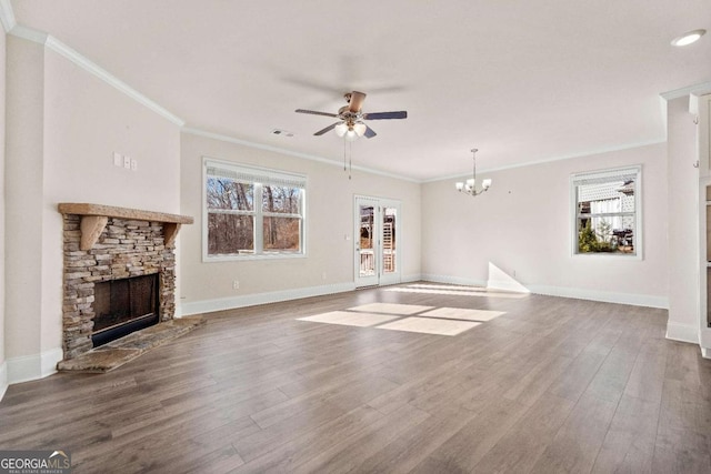 724 Broken Arrow, Waleska, GA 30183 - unfurnished living room with healthy amount of natural light, ceiling fan, a fireplace, wood finished floors, and crown molding