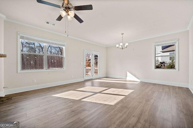 724 Broken Arrow, Waleska, GA 30183 - unfurnished living room featuring ornamental molding, wood finished floors, a chandelier, a ceiling fan, and baseboards