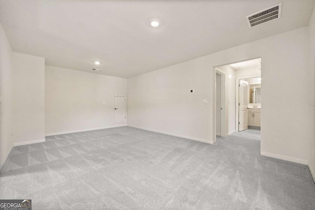 724 Broken Arrow, Waleska, GA 30183 - empty room featuring light carpet, baseboards, attic access, and recessed lighting