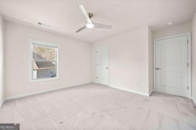 724 Broken Arrow, Waleska, GA 30183 - unfurnished bedroom featuring baseboards, carpet, and a ceiling fan