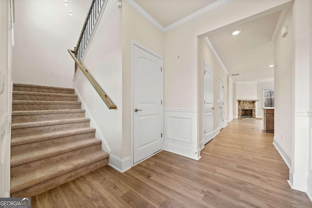 724 Broken Arrow, Waleska, GA 30183 - stairs featuring crown molding, wood finished floors, a wainscoted wall, recessed lighting, and baseboards