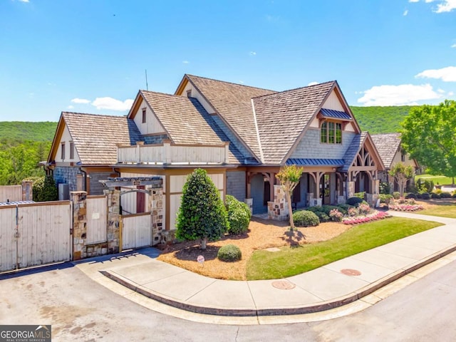 724 Broken Arrow, Waleska, GA 30183 - view of front facade with a gate, stone siding, and a porch